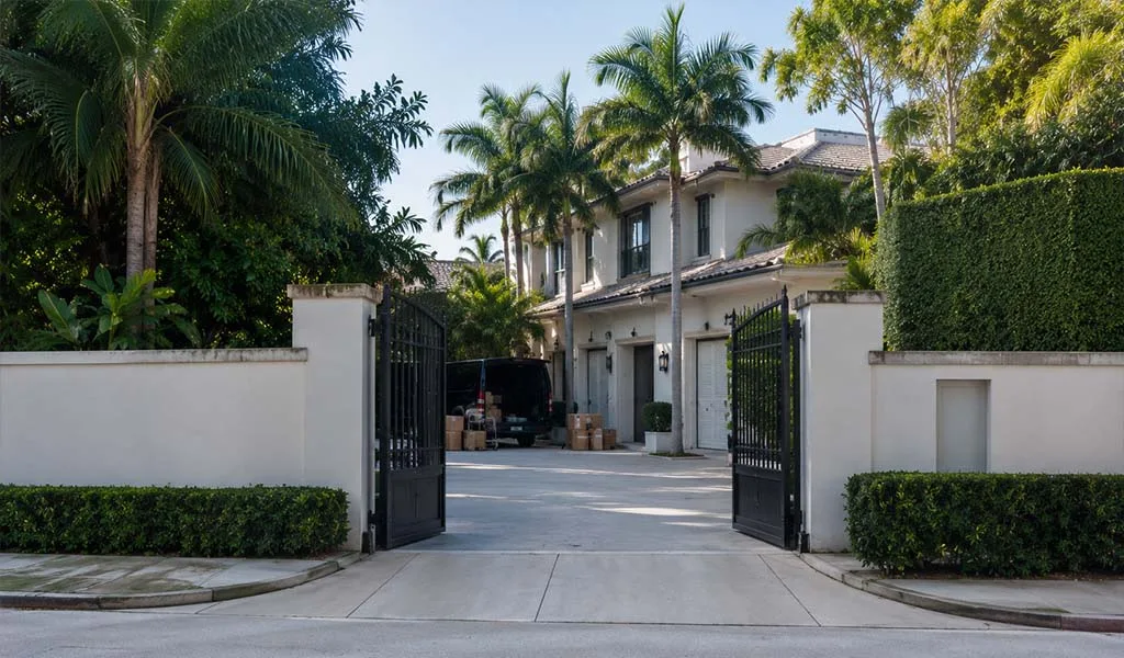 Service entrance and vendor access area at a luxury Palm Beach estate