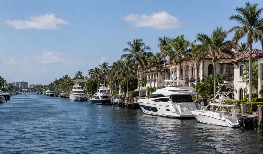 Luxury canal-front estates and superyachts along Fort Lauderdale's waterways illustrating the city's integrated maritime environment.