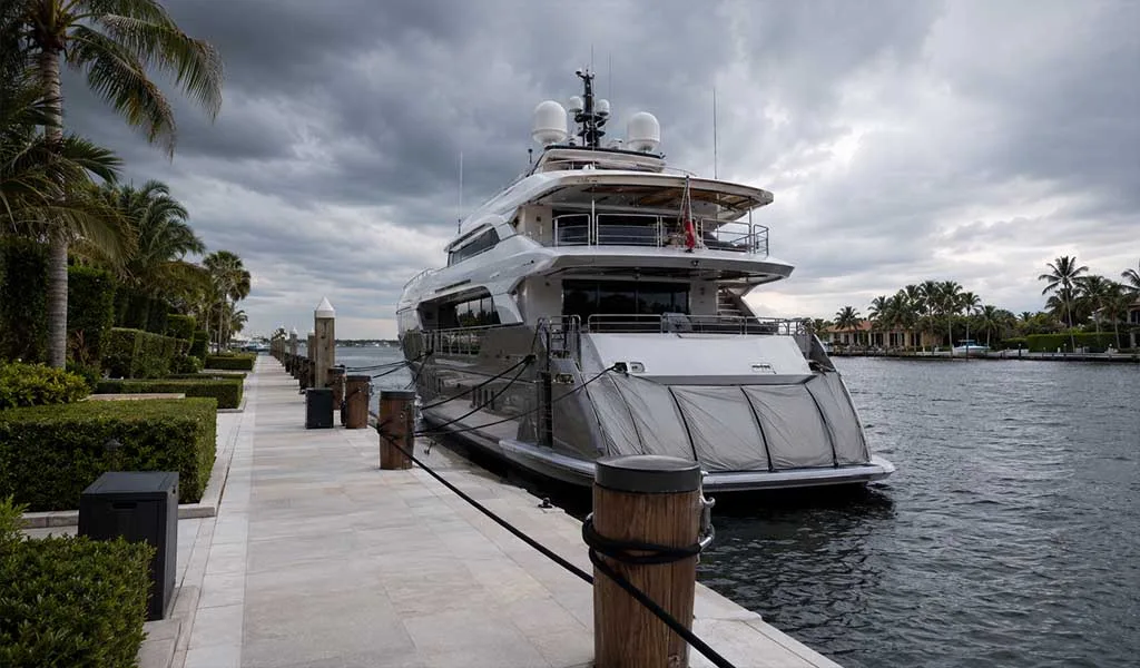 Luxury yacht secured at a protected dock before hurricane season.