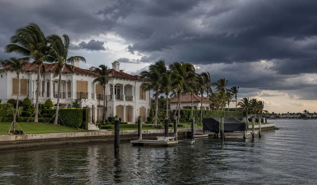 Luxury Jupiter waterfront estate prepared for hurricane season along the Intracoastal Waterway.