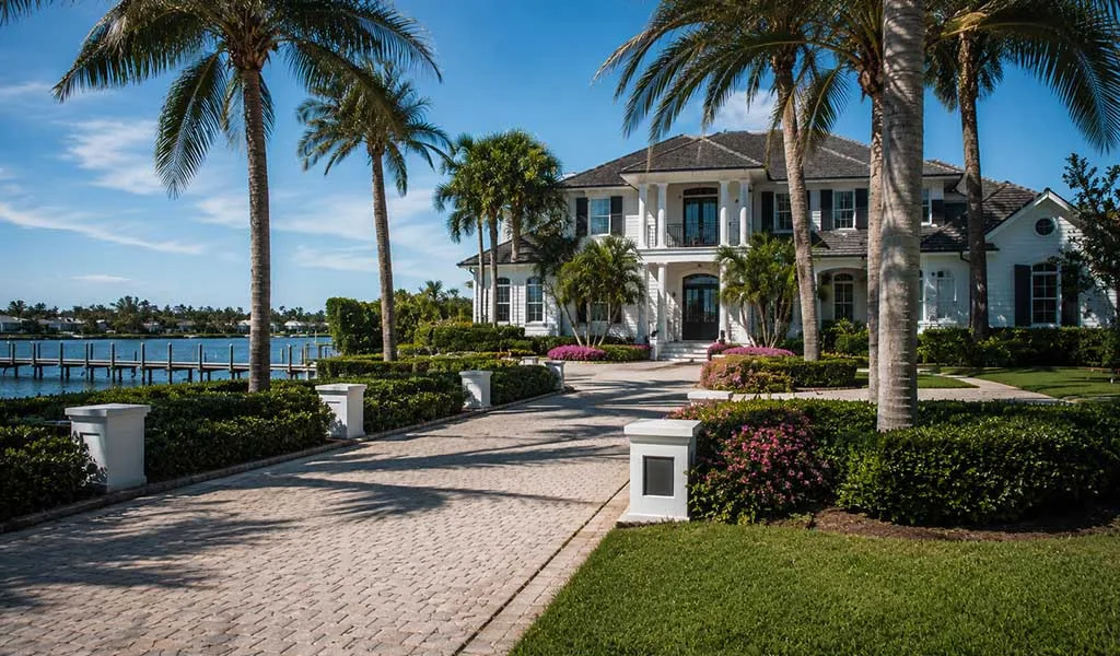 Luxury waterfront estate inside a gated Jupiter community.