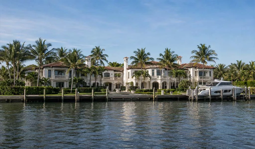 Luxury Manalapan estate viewed from the Intracoastal Waterway illustrating publicly visible waterfront exposure