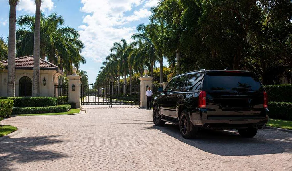 Gated luxury community entrance in Jupiter with estate security patrol